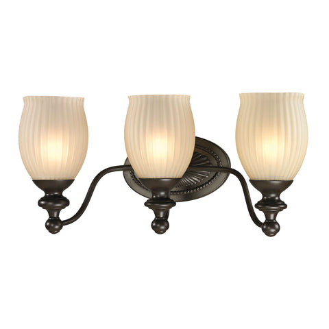 Park Ridge 3 Light Vanity In Oil Rubbed Bronze And Reeded Glass