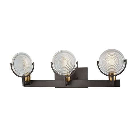 Ocular 3 Light Vanity In Oil Rubbed Bronze With Satin Brass Accents And Clear Railroad Light Glass